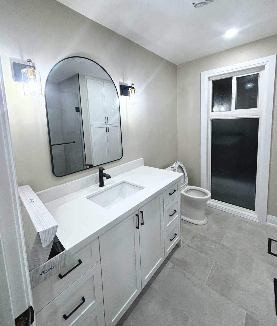 custom bathroom tower with white MDF vanity mix brushed gold