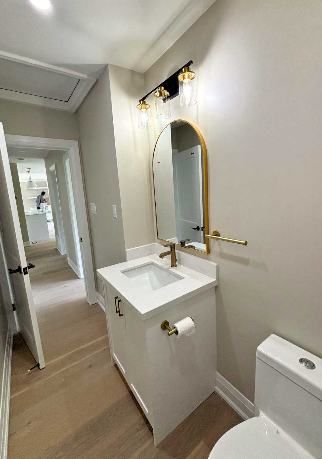 custom bathroom tower with white MDF vanity mix brushed gold