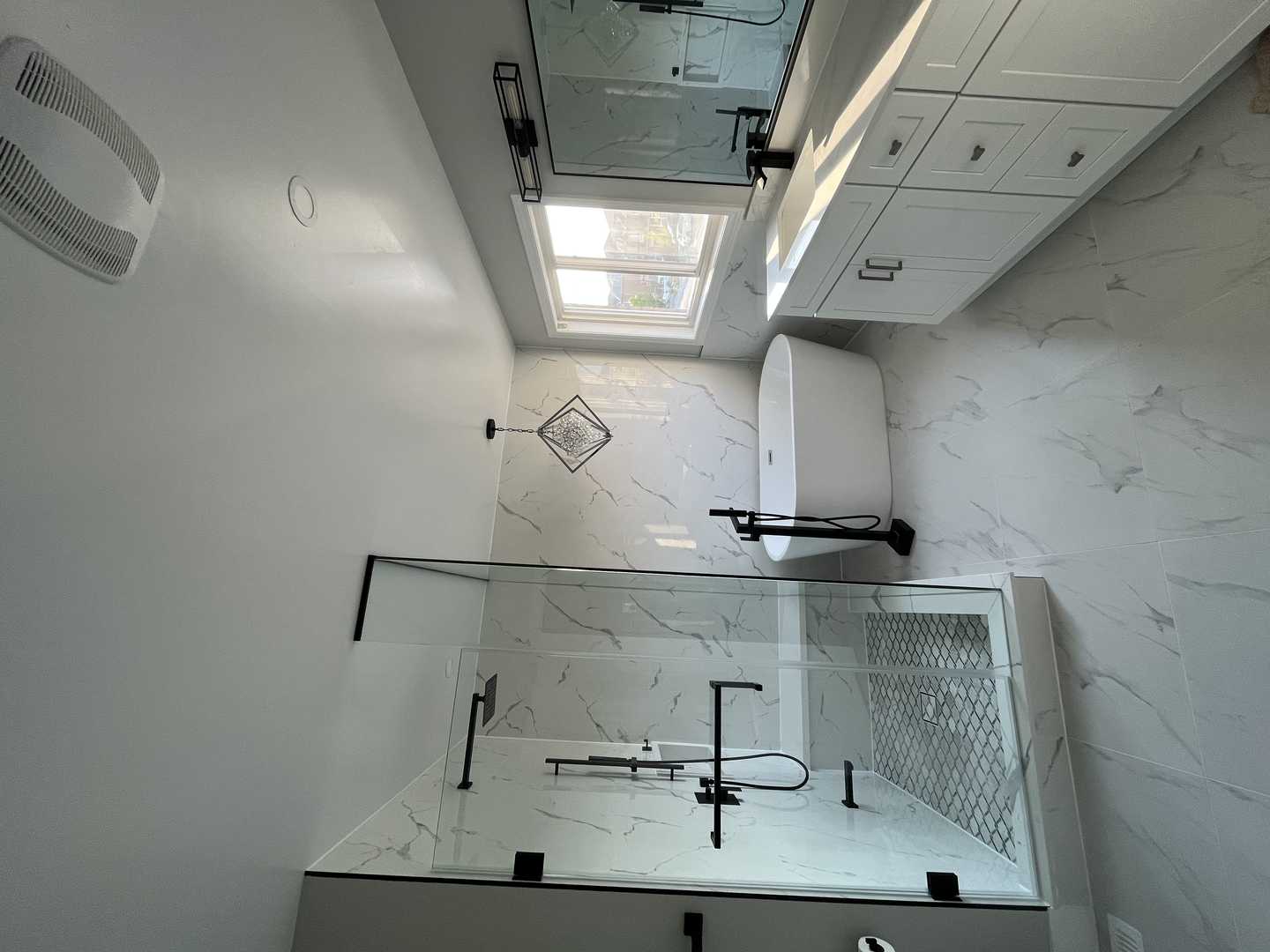 White design bathroom, Track Shape Mirror, Stand alone bathtub.