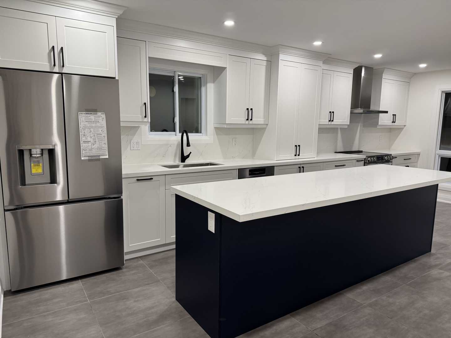 Complete home renovation featuring built-in closets, a kitchen with cabinets