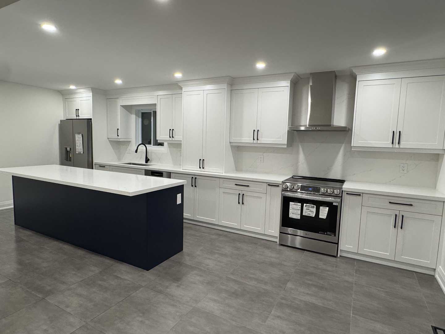 Complete home renovation featuring built-in closets, a kitchen with cabinets
