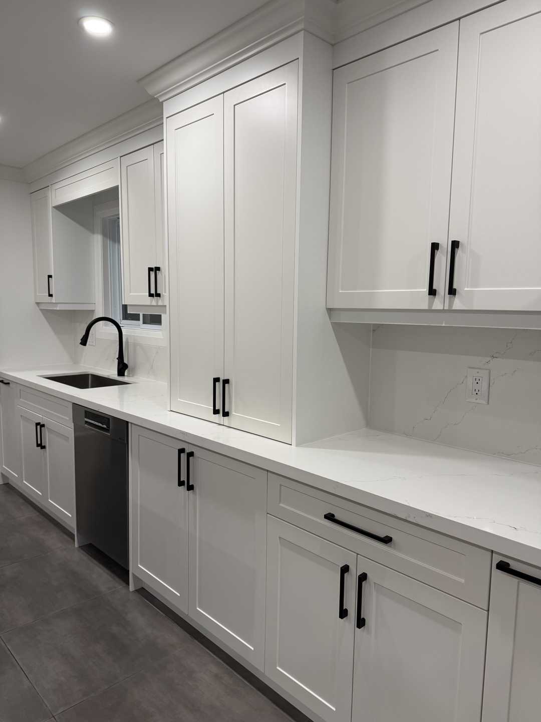 Complete home renovation featuring built-in closets, a kitchen with cabinets