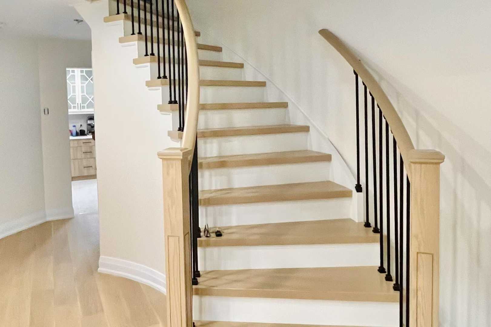 Complete floor renovation throughout the house, including the staircase in